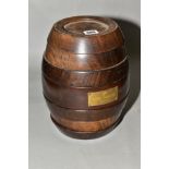 A REMY MARTIN BARREL GAME COLLECTION, in the form of a seven section wooden barrel, complete with