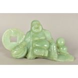 A CARVED GREEN HARDSTONE LAUGHING BUDDHA, seated with a bag and disc, approximate height 12cm x