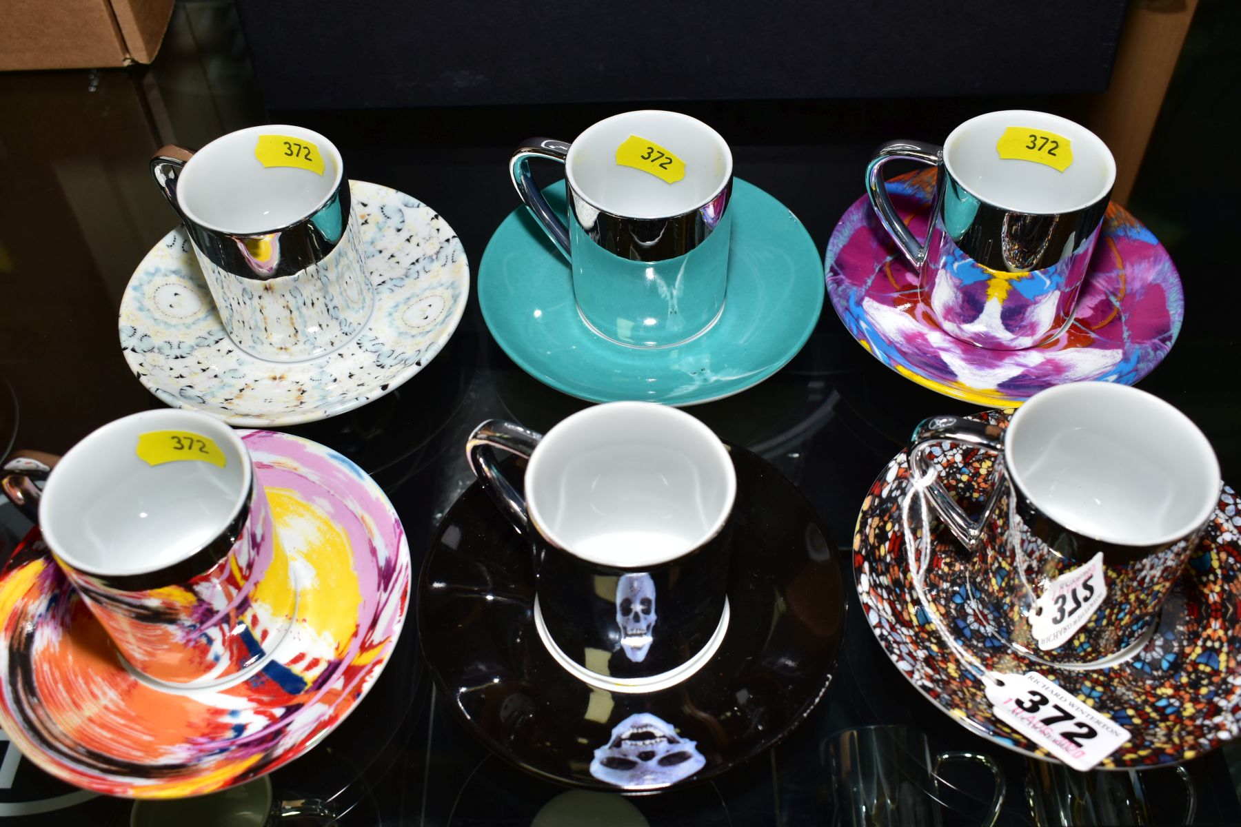 DAMIEN HIRST (BRITISH 1965), A PORCELAIN ESPRESSO SET comprising six different design saucers and - Image 6 of 10