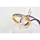 A 9CT GOLD SAPPHIRE RING, the half eternity style ring, set with a row of multi coloured princess