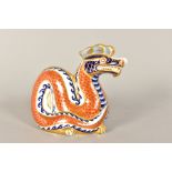 A ROYAL CROWN DERBY DRAGON PAPERWEIGHT, with gold stopper