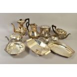 A BOX OF SILVER PLATE, including two Art Deco shaped rectangular dishes, swing handled cake