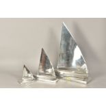 A SET OF THREE GRADUATING CHROME SAILBOATS, approximate tallest height 50cm, smallest height 15cm (