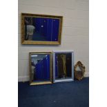 A LATE 20TH CENTURY FOLIATE GILT FRAMED BEVELLED EDGE WALL MIRROR, approximately 103cm x 74cm,