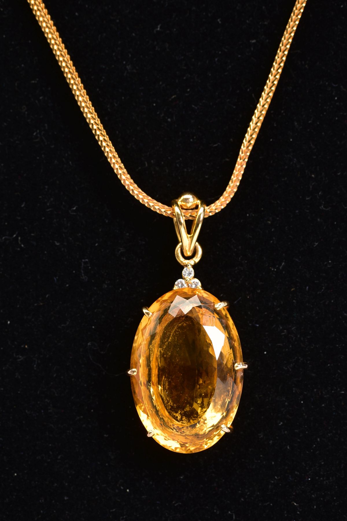 A LARGE CITRINE AND DIAMOND PENDANT AND CHAIN, oval mixed cut citrine stone measuring - Image 2 of 3