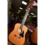 A CRAFTER MD50 12N ACOUSTIC TWELVE STRING GUITAR IN NATURAL FINISH, and an Elevation padded soft