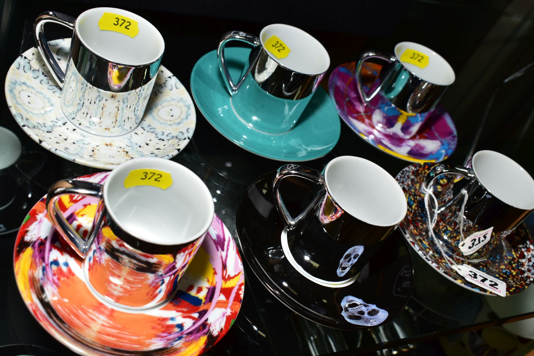 DAMIEN HIRST (BRITISH 1965), A PORCELAIN ESPRESSO SET comprising six different design saucers and - Image 8 of 10