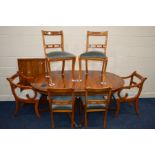 A MODERN YEW WOOD TWIN PEDESTAL DINING TABLE, on additional leaf, extended length 235cm x closed