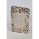A VICTORIAN SILVER CARD CASE OF PIERCED AND WAVY RECTANGULAR FORM, engine turned decoration with