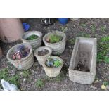 THREE LARGE ROUND COMPOSITE GARDEN PLANTERS, 39cm diameter and 30cm high, a pair of smaller 29cm