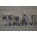 FOUR STAINLESS STEEL ADVERTISING LETTERS, include the letters T, S, A, I