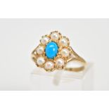 A 9CT GOLD CLUSTER RING, designed with a central oval cabochon turquoise with a split pearl