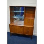 A MID 20TH CENTURY TEAK HIGHBOARD, with double sliding glass doors with a mirror back, two fall