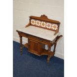 AN EDWARDIAN WALNUT WASHSTAND, with a tile backsplash, marble top, single drawer and central