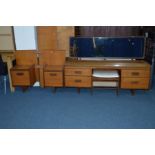 A WHITE & NEWTON TEAK DRESSING TABLE, with a rectangular mirror, four drawers, width 568cm x depth