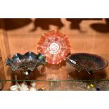 TWO PURPLE CARNIVAL GLASS FOOTED DISHES, one with grape decoration, approximate diameter 23cm and