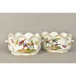 A PAIR OF 19TH CENTURY CACHE POTS OF WAVY OVAL FORM, short scroll handles, painted with exotic birds