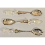 A PAIR OF LATE VICTORIAN SILVER AND CUT GLASS HANDLED SALAD SERVERS, shell shaped bowls, engraved