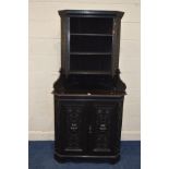 AN EARLY 20TH CENTURY EBONISED CARVED OAK CORNER UNIT, width 91cm x depth 53cm x height 184cm