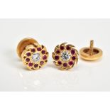 A PAIR OF RUBY AND DIAMOND ROUND STUD EARRINGS, centering on a round brilliant cut diamond
