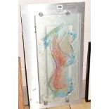 A DECORATIVE GLASS AND STEEL WALL HANGING, depicting a figure of a female, composed of fused glass