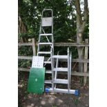 AN ALUMINUM FOLDING PLATFORM LADDER, with three rungs to each of the four sections, 100cm long,