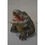 A MODERN RESIN LIFE SIZE FIGURE OF AN ALLIGATOR HEAD AND ARMS