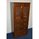 AN EDWARDIAN WALNUT TWO DOOR CABINET, four drawers, width 75cm x depth 51cm x height 158cm (