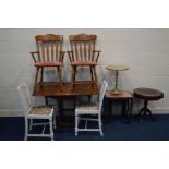 AN OAK BARLEY TWIST DROP LEAF TABLE, a pair of American carvers, two painted chairs, a mahogany wine