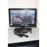 A PHILIPS 19PFL3404D 19'' LCD TV, together with a Ferguson freeview box, two remotes (all PAT