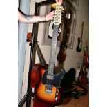 A TELECASTER STYLE TWELVE STRING GUITAR, with a tobacco sunburst finish, black scratchplate,