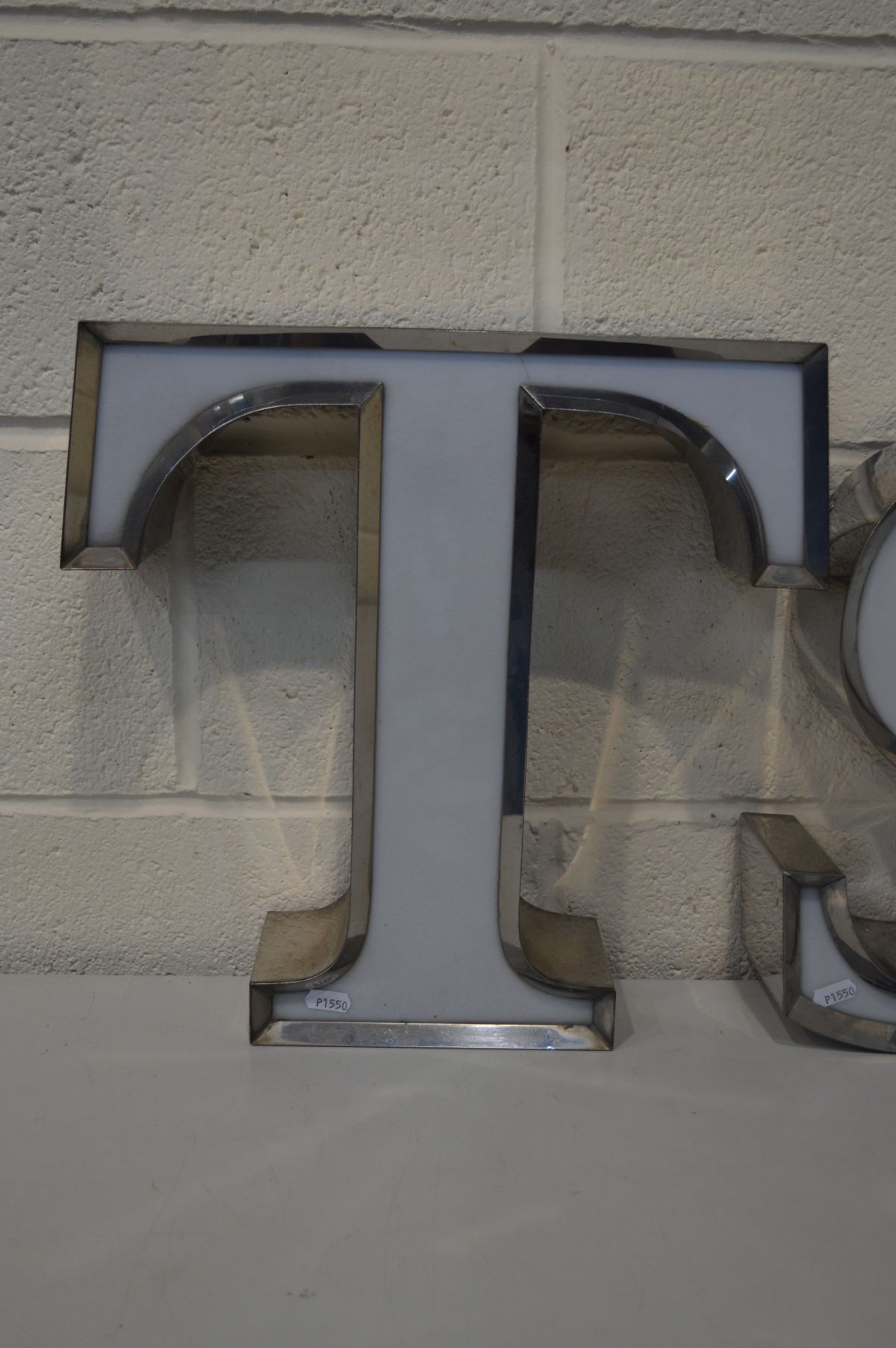 FOUR STAINLESS STEEL ADVERTISING LETTERS, include the letters T, S, A, I - Image 4 of 4