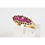 AN 18CT GOLD FIVE STONE RING, of boat design set with oval and circular cut rubies, interspaced with