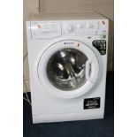 A HOTPOINT AQUARIUS WMAQL 741 WASHING MACHINE, (PAT pass), together with a Sharp microwave (PAT