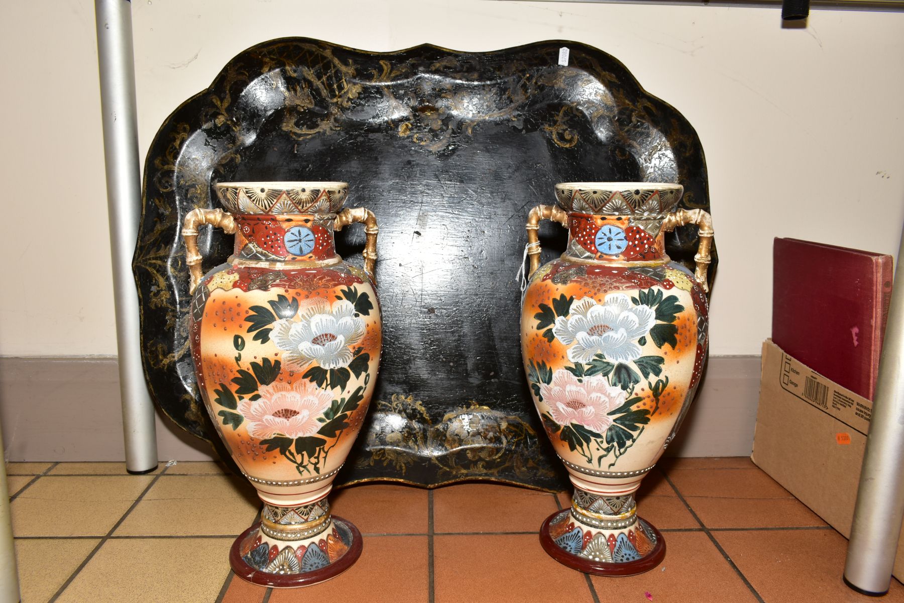 A PAIR OF SATSUMA TWIN HANDLED VASES, floral design, approximate height 39cm, (one with hairline,