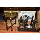 A BOX OF METALWARES AND PICTURES AND A FOLDING BRASS TOPPED TABLE, a pair of spelter figures of