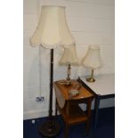 A 1970'S TEAK OVAL DROP LEAF TEA TROLLEY, an oak standard lamp, two tables lamps, all with fabric