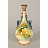 A ROYAL WORCESTER HADLEY BUD VASE, SHAPE 214, retriculated neck above a twin handled baluster