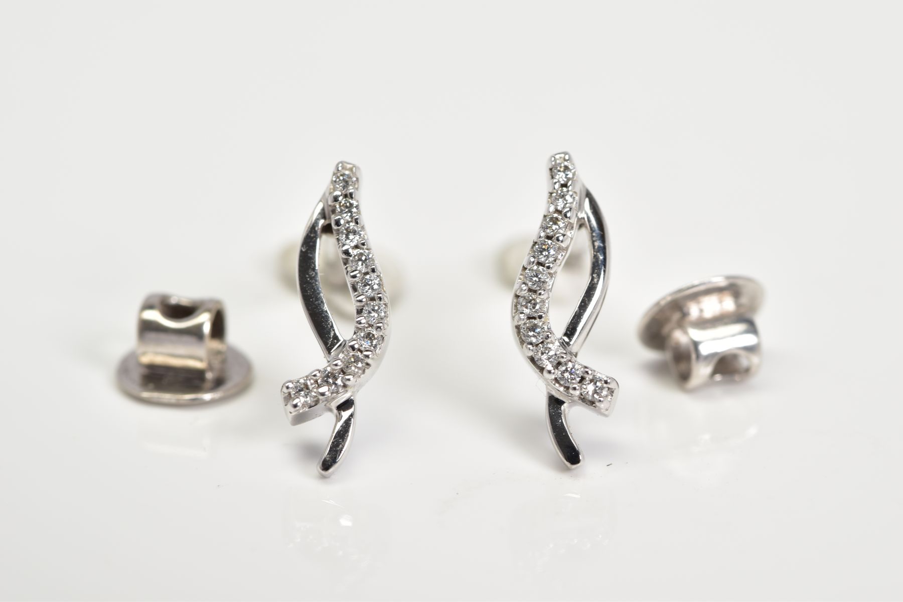 A MODERN PAIR OF DIAMOND STUD EARRINGS, estimated total modern round brilliant cut weight 0.20ct, - Image 3 of 3