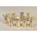 A MATCHED SET OF EIGHT SILVER PLATE/PEWTER STIRRUP CUPS, cast with animal mask or bird finials,