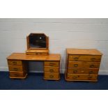 A MODERN PINE DRESSING TABLE, with six drawers and a separate swing mirror with a single drawer,