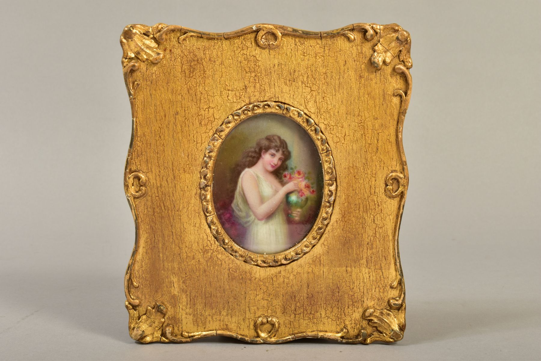 A LESLIE JOHNSON (ROYAL DOULTON ARTIST) PORCELAIN PLAQUE, oval painted with a classically dressed