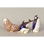 THREE ROYAL CROWN DERBY PAPERWEIGHTS, 'Dolphin', 'Walrus' and 'Penguin' all with gold stopper and