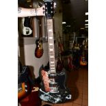 A MARQUEE CLUB 'SG' TYPE GUITAR in black with Marquee graphics to top