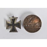 A GERMAN 3RD REICH WWII IRON CROSS 2ND CLASS, no ribbon, two piece construction, no makers mark on