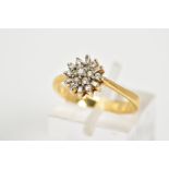 A MODERN ROUND DIAMOND CLUSTER RING, estimated modern round brilliant cut weight 0.21ct, ring size
