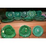 A GROUP OF 19TH AND 20TH CENTURY GREEN GLAZED LEAF MOULDED PLATES, including Wedgwood, Brameld, 20th
