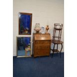 A MID 20TH CENTURY BUREAU with three drawers, together with three various wall mirrors, Edwardian