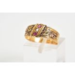 AN 18CT GOLD VICTORIAN RING, set with a diagonal row of two circular cut rubies interspaced by a