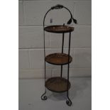 AN EARLY 20TH CENTURY ART NOUVEAU WROUGHT IRON AND COPPER THREE TIER CAKE STAND